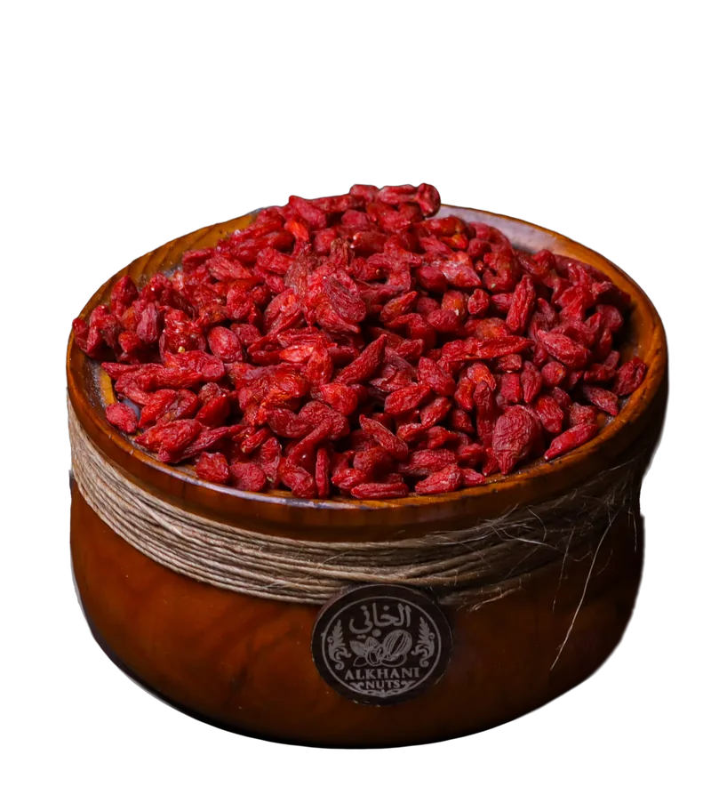توت غوجي، حبات حمرا صغيرة متطاولة ومجعّدة، بزبدية خشب ملفوفة بخيط خيش وعليها ختم الخاني